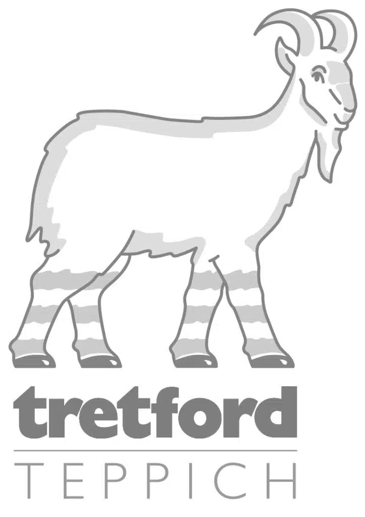 Logo von Tretford Teppiche mit einer Ziege.